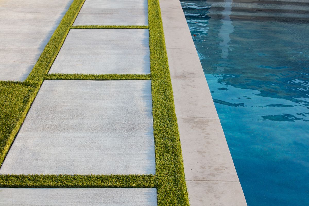 Backyard Pool and Deck Turf Strips